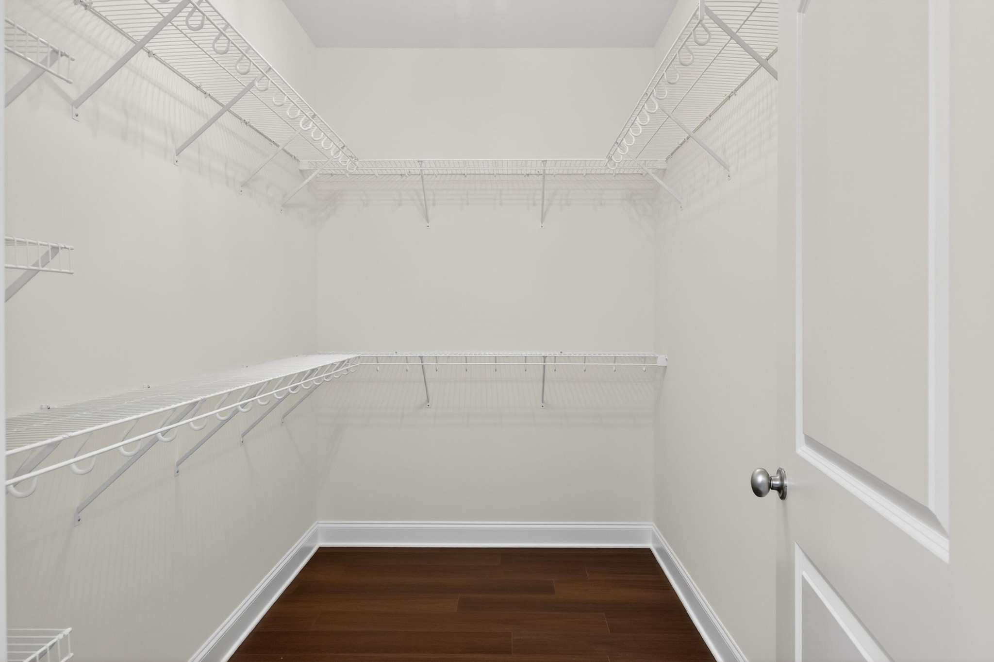 413 Haig Ml Lk Road, Unit 5 Dalton, GA 30720 - Photo 12 of 50 a view of a room with racks on the wall
