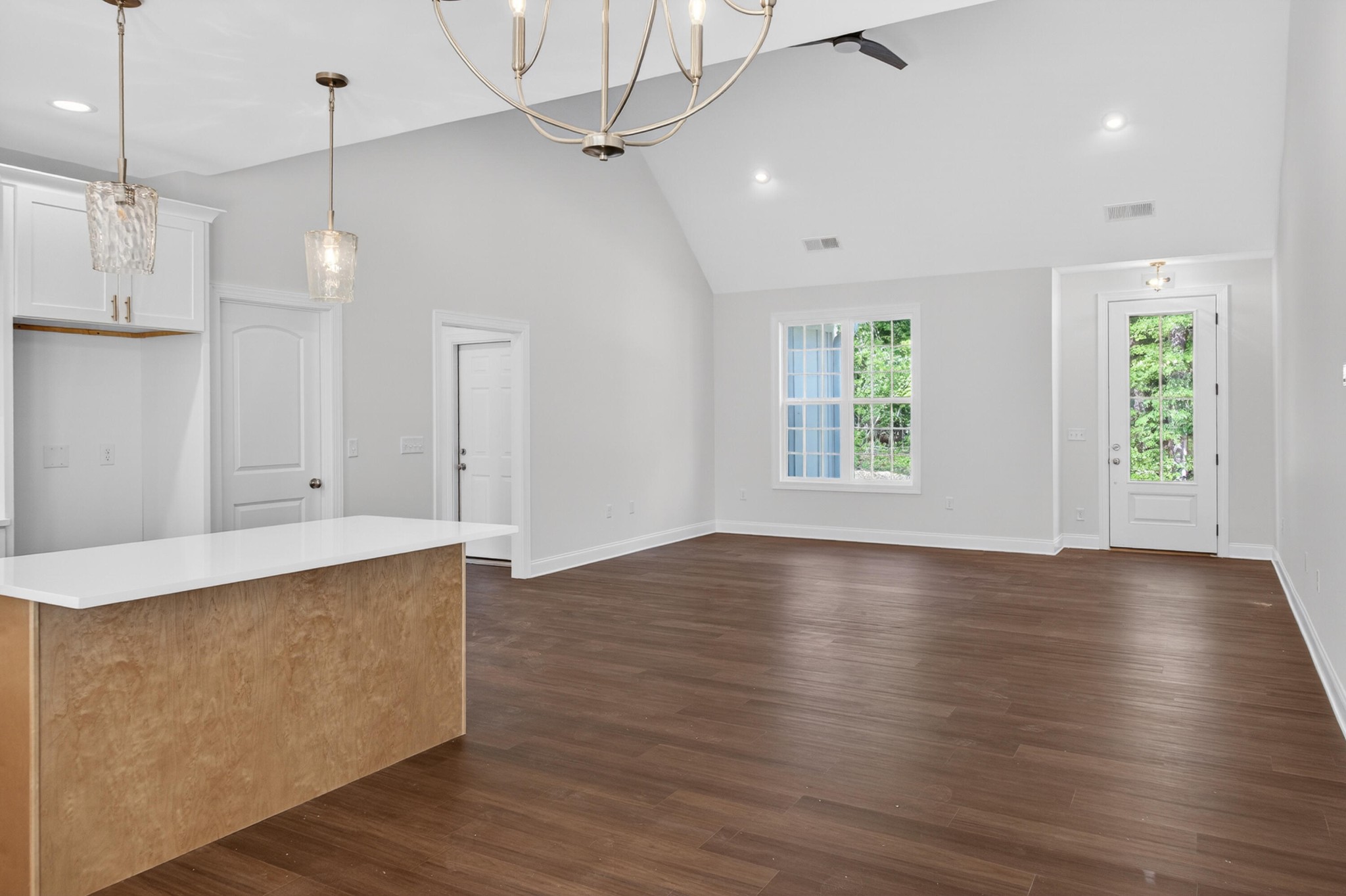 413 Haig Ml Lk Road, Unit 5 Dalton, GA 30720 - Photo 22 of 50 an empty room with wooden floor and windows