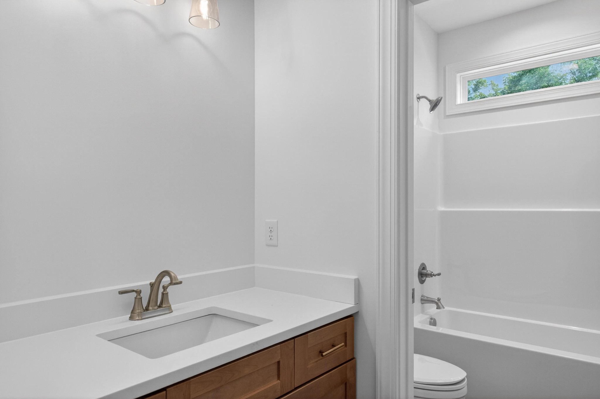 413 Haig Ml Lk Road, Unit 5 Dalton, GA 30720 - Photo 31 of 50 a bathroom with a sink toilet a vanity and bathtub