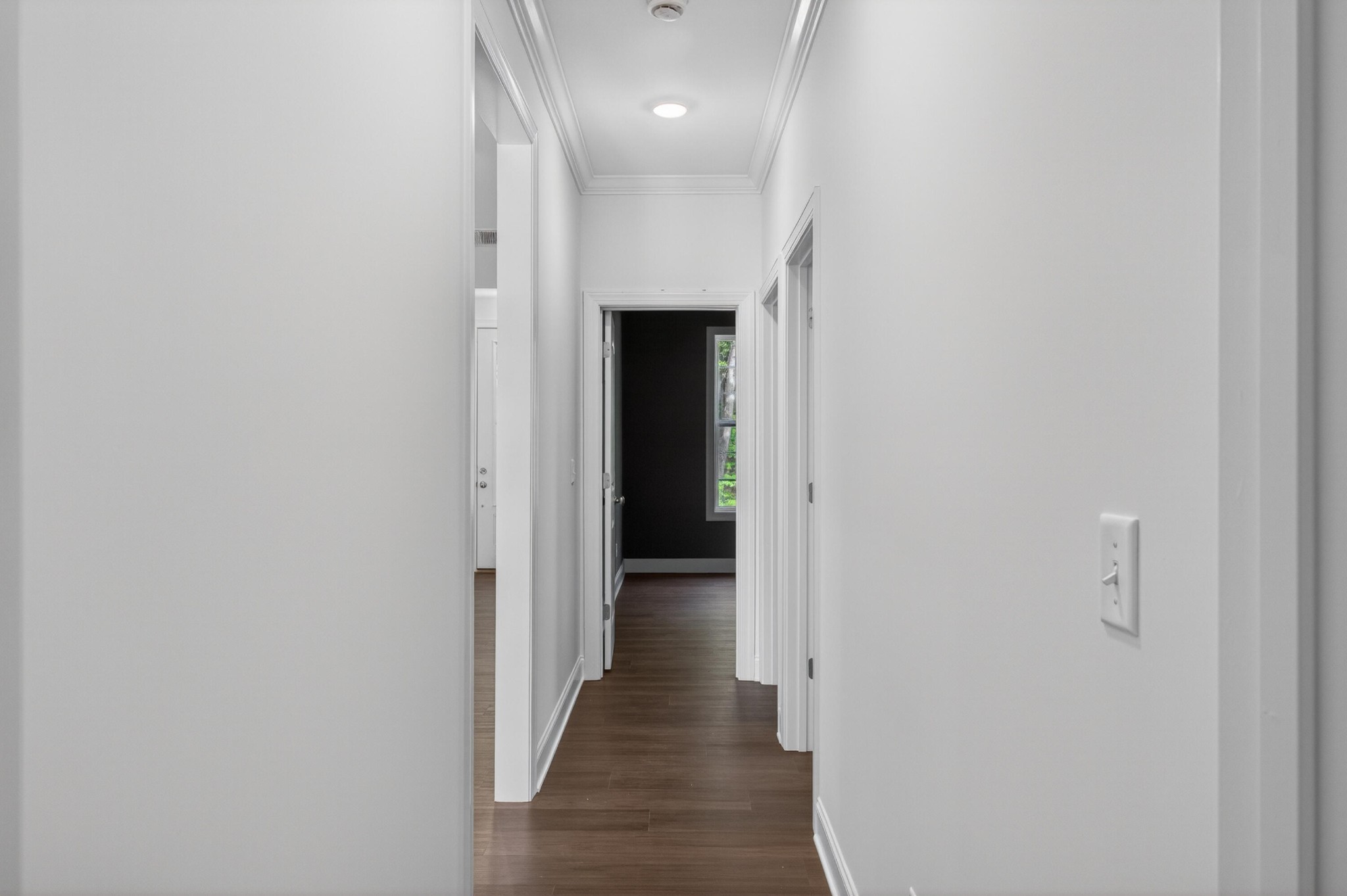 413 Haig Ml Lk Road, Unit 5 Dalton, GA 30720 - Photo 37 of 50 a view of a hallway with wooden shelves
