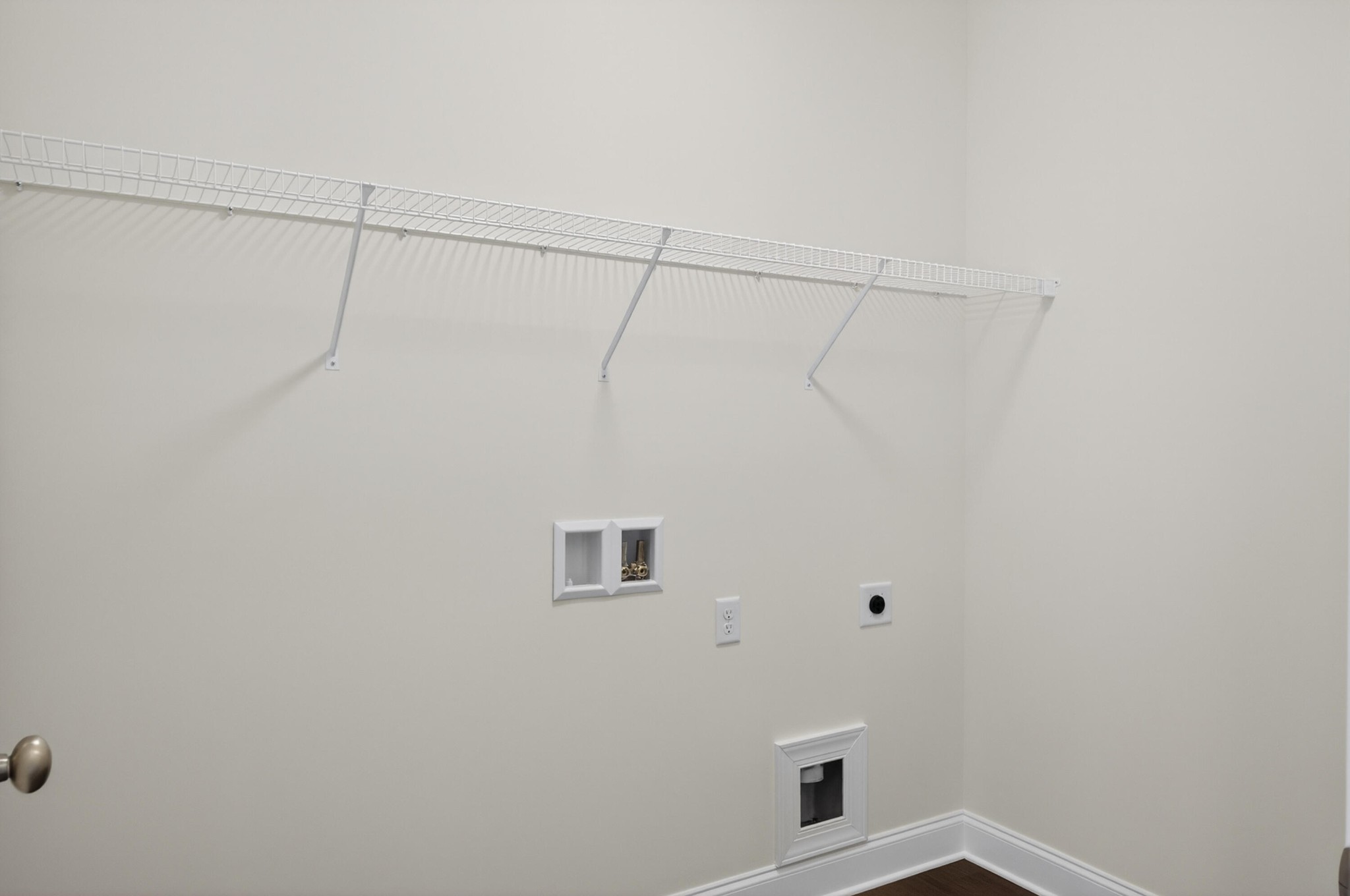 413 Haig Ml Lk Road, Unit 5 Dalton, GA 30720 - Photo 40 of 50 a view of a room with racks on the wall