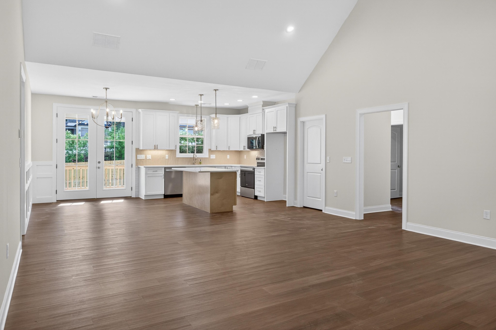 413 Haig Ml Lk Road, Unit 5 Dalton, GA 30720 - Photo 6 of 50 a view of kitchen with furniture and wooden floor