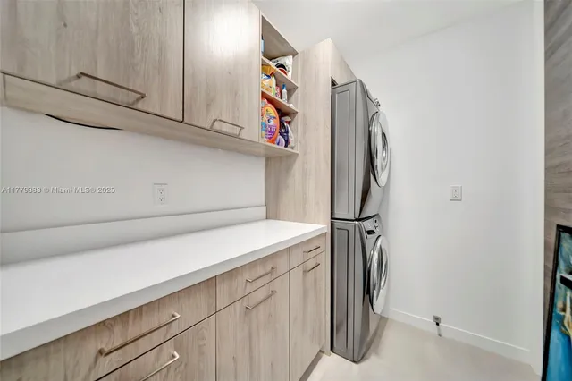 a utility room with cabinets