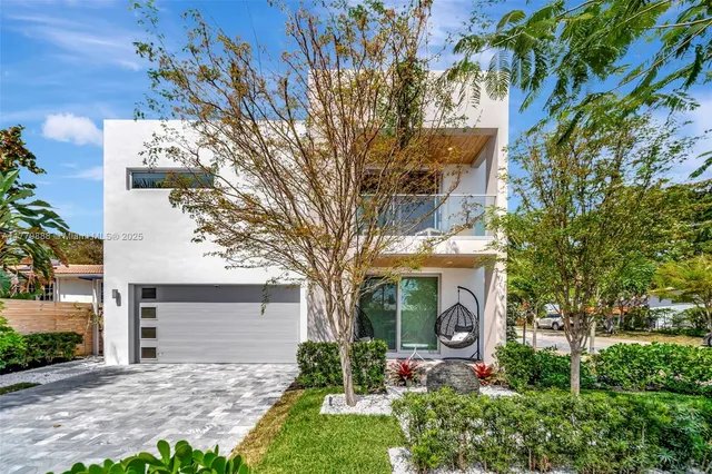 a view of a backyard with garden