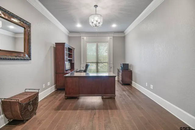 a room with furniture and wooden floor