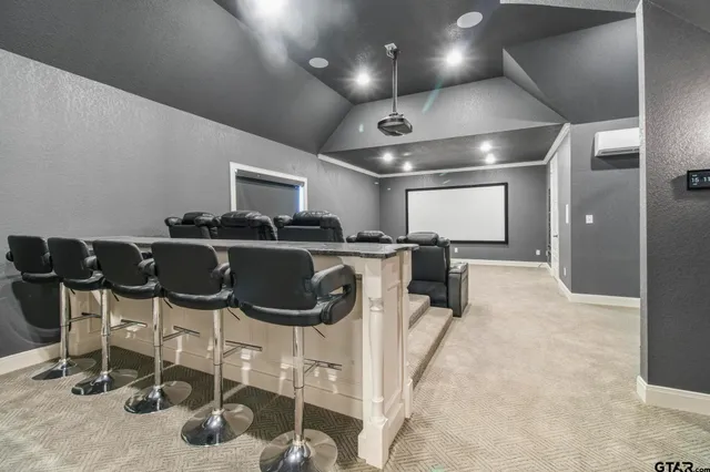 a kitchen with a table and chairs