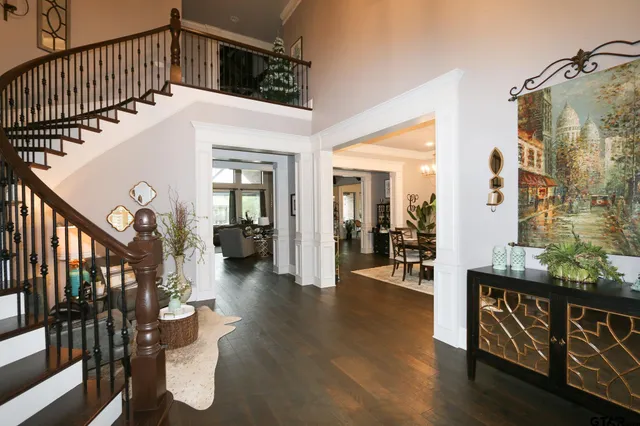 a view of living room and wooden floor