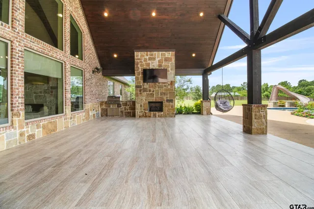 a lobby with furniture and wooden floor
