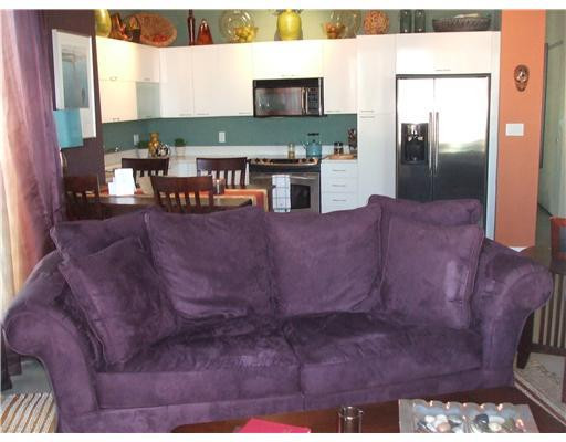 234 Northeast 3rd Street, Unit 1802 Miami, FL 33132 - Photo 2 of 25 a living room with furniture and a flat screen tv