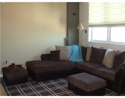 234 Northeast 3rd Street, Unit 1802 Miami, FL 33132 - Photo 9 of 25 a living room with furniture and a window