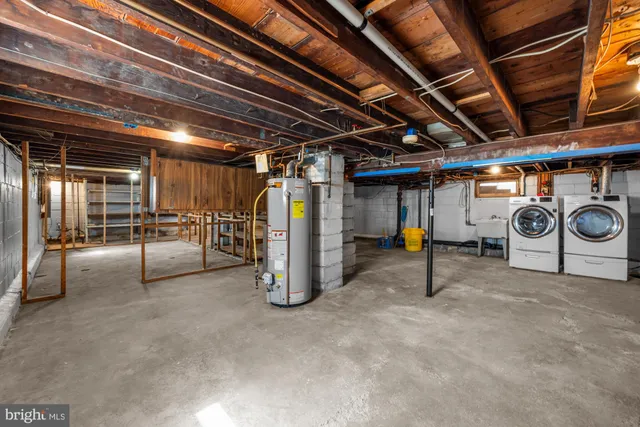 a view of empty room with wooden ceiling