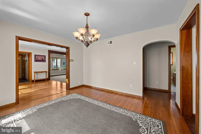 a view of a livingroom with wooden floor