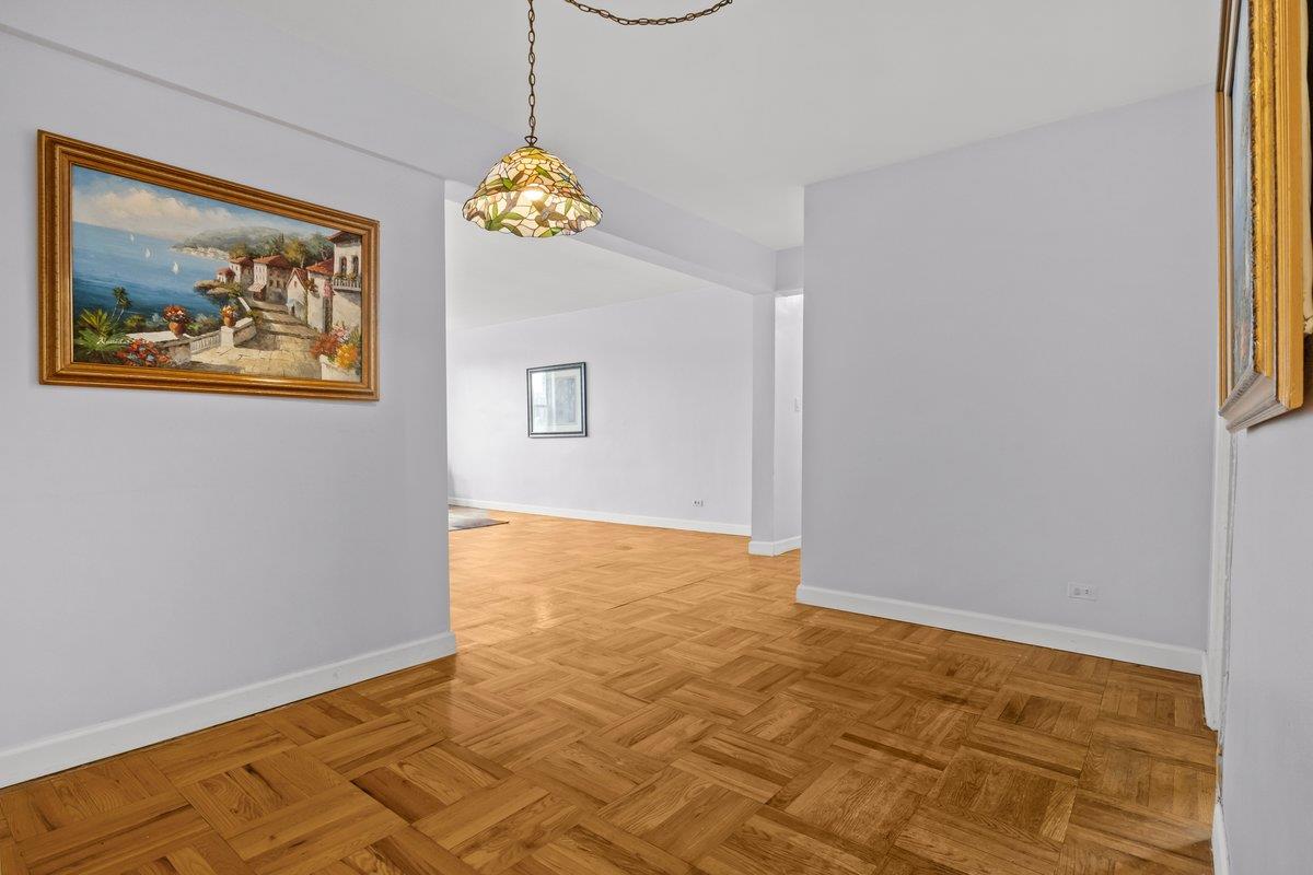 5601 Riverdale Avenue, Unit 5F Bronx, NY 10471 - Photo 12 of 25 a view of an entryway with wooden floor
