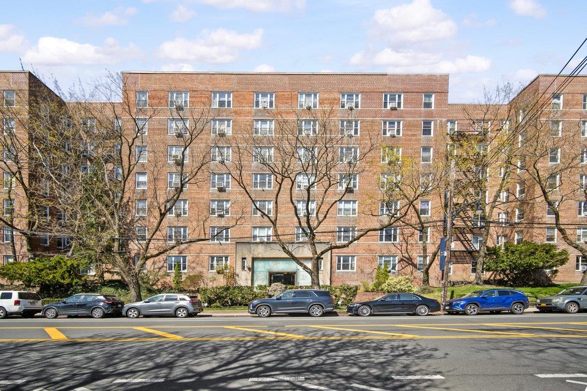 5601 Riverdale Avenue, Unit 5F Bronx, NY 10471 - Photo 2 of 25 a city view of building with cars parked