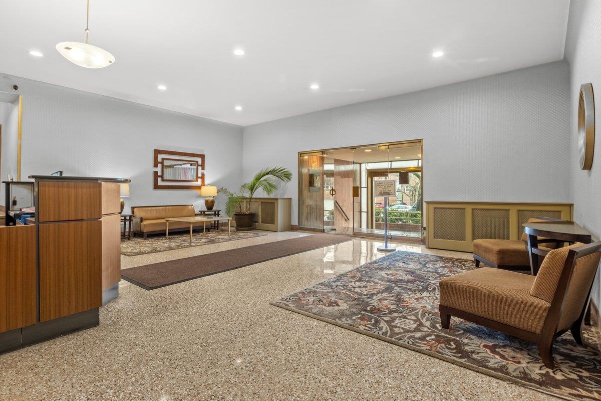 5601 Riverdale Avenue, Unit 5F Bronx, NY 10471 - Photo 5 of 25 a living room with furniture