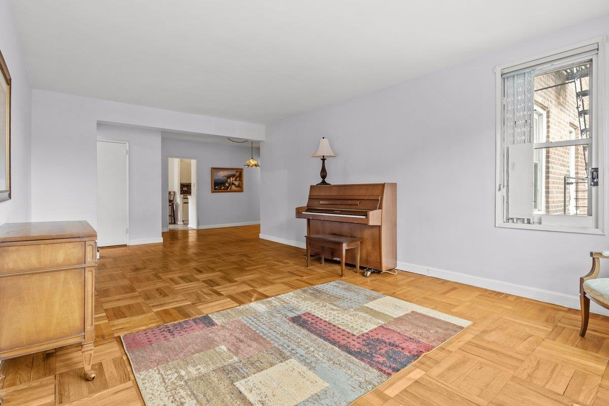 5601 Riverdale Avenue, Unit 5F Bronx, NY 10471 - Photo 9 of 25 a bedroom with a bed and a window