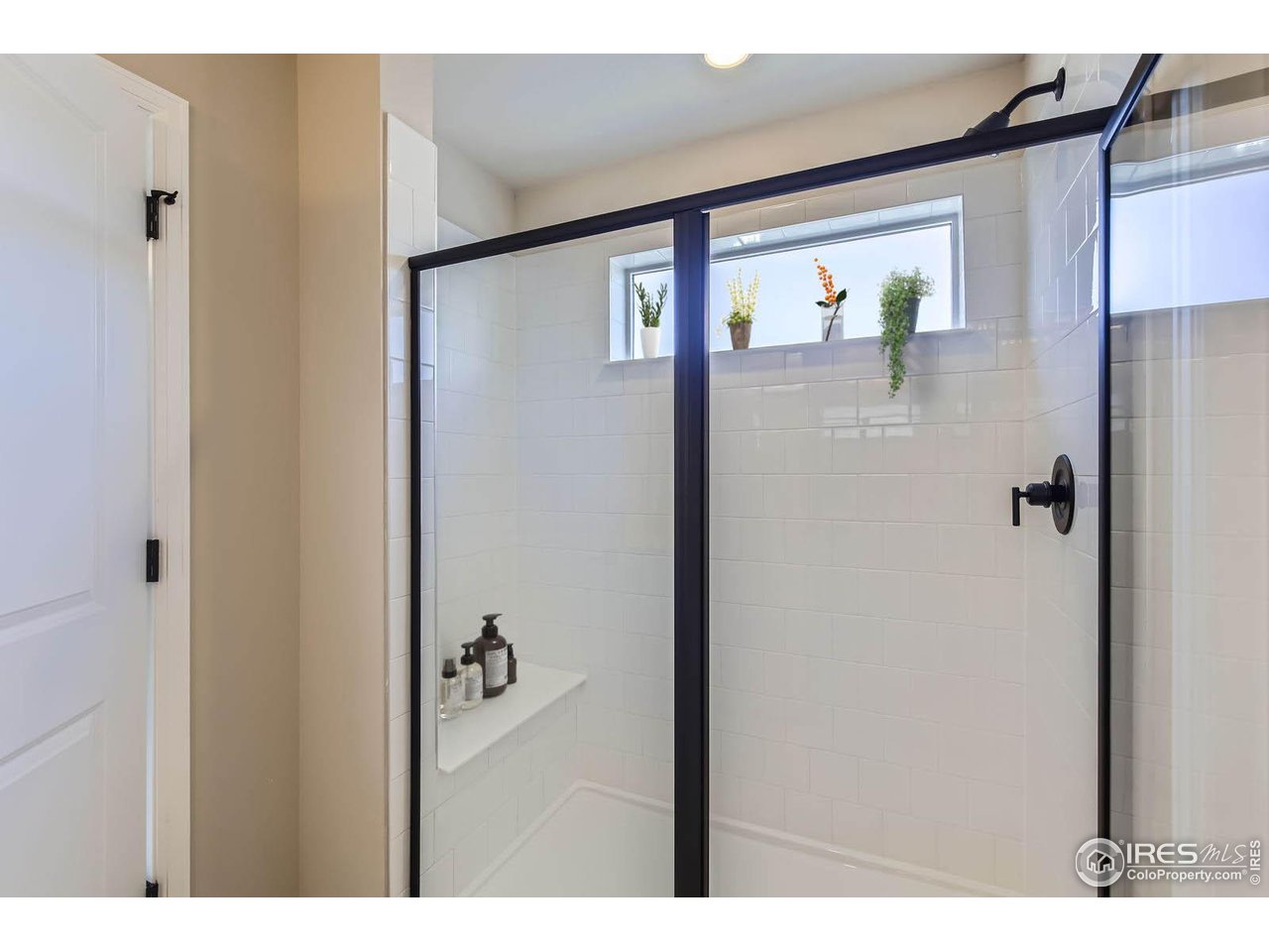 2344 Walbridge Road Fort Collins, CO 80524 - Photo 10 of 22 a picture of a bathroom with a shower
