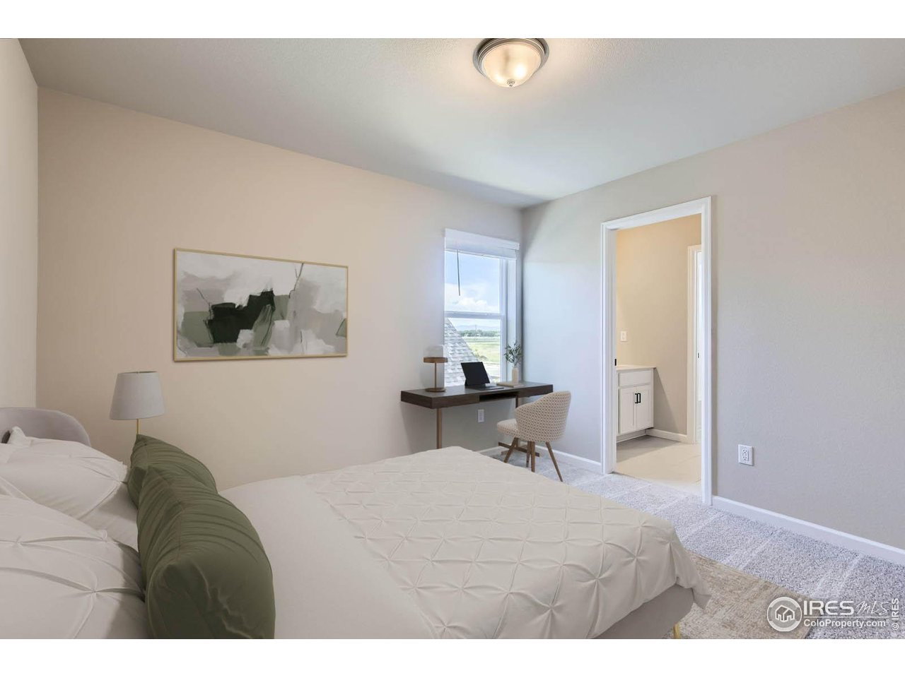 2344 Walbridge Road Fort Collins, CO 80524 - Photo 12 of 22 a bedroom with a bed and a table