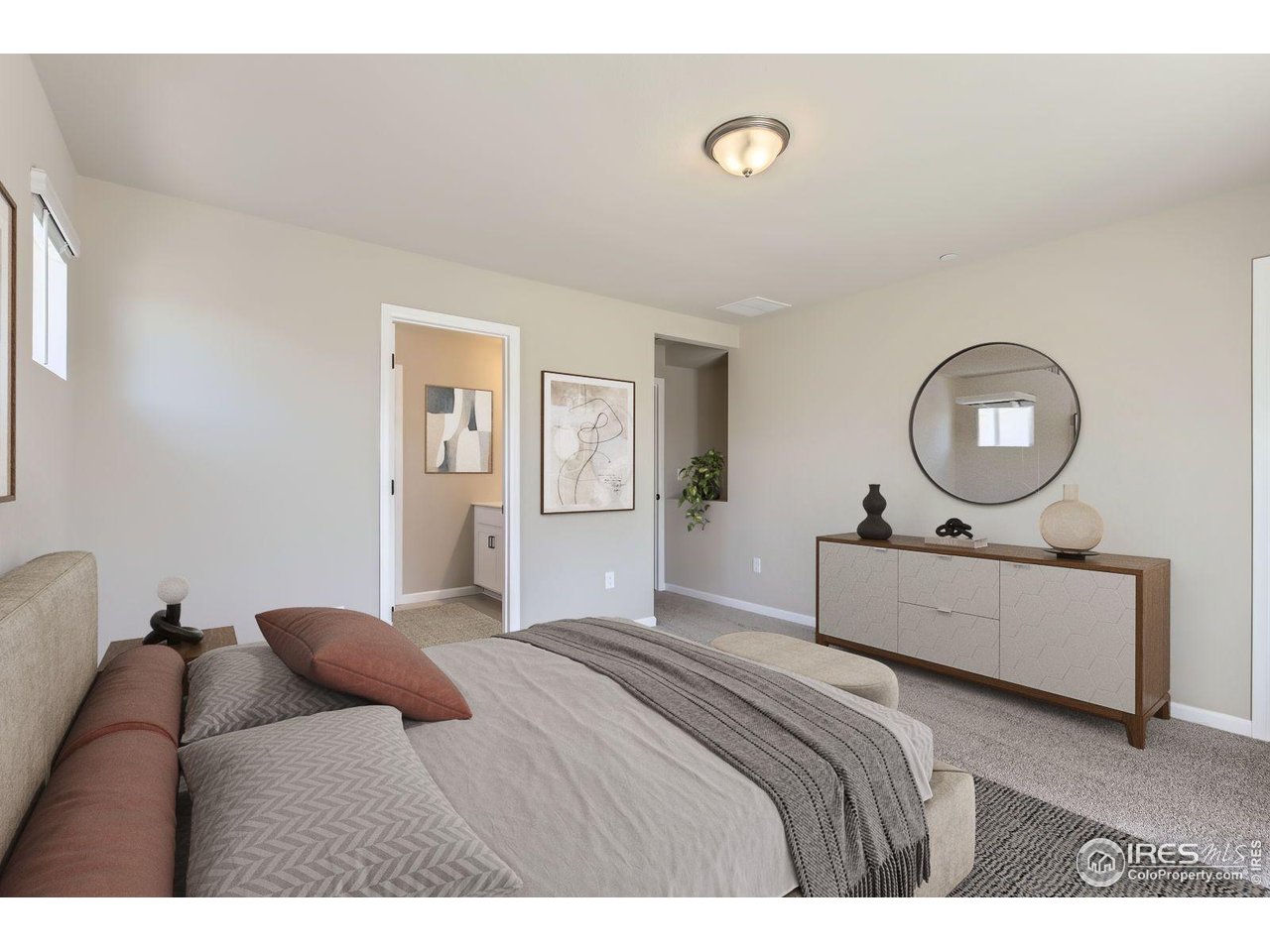 2344 Walbridge Road Fort Collins, CO 80524 - Photo 8 of 22 a bedroom with a bed and a dresser