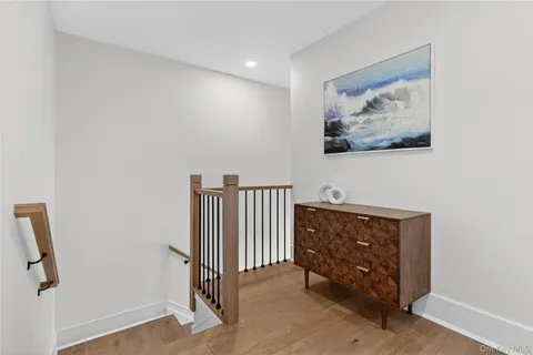 a spacious bedroom with a bed and a couch