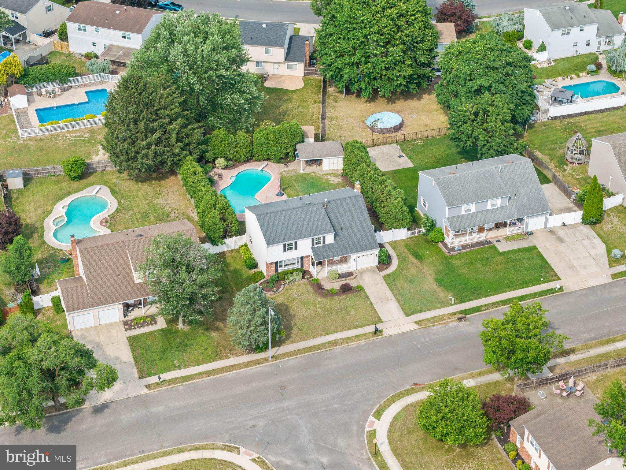 8 Chesterfield Road Sewell, NJ 08080 - Photo 50 of 57 an aerial view of a house with outdoor space pool seating area and yard
