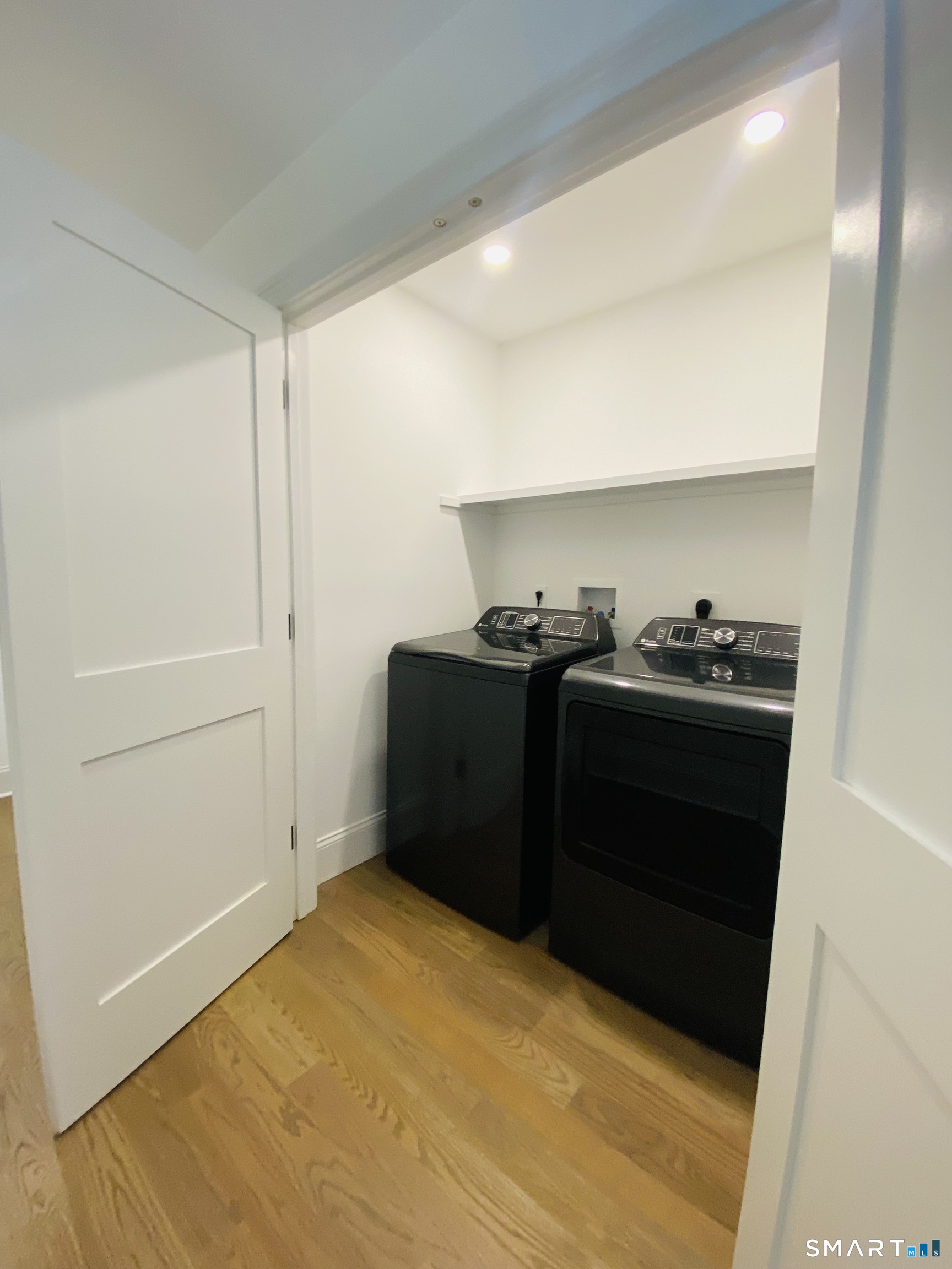 28 Country Road Fairfield, CT 06824 - Photo 14 of 14 laundry come complete with washer and dryer .