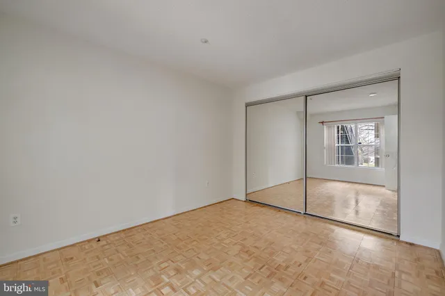 a view of an empty room and window