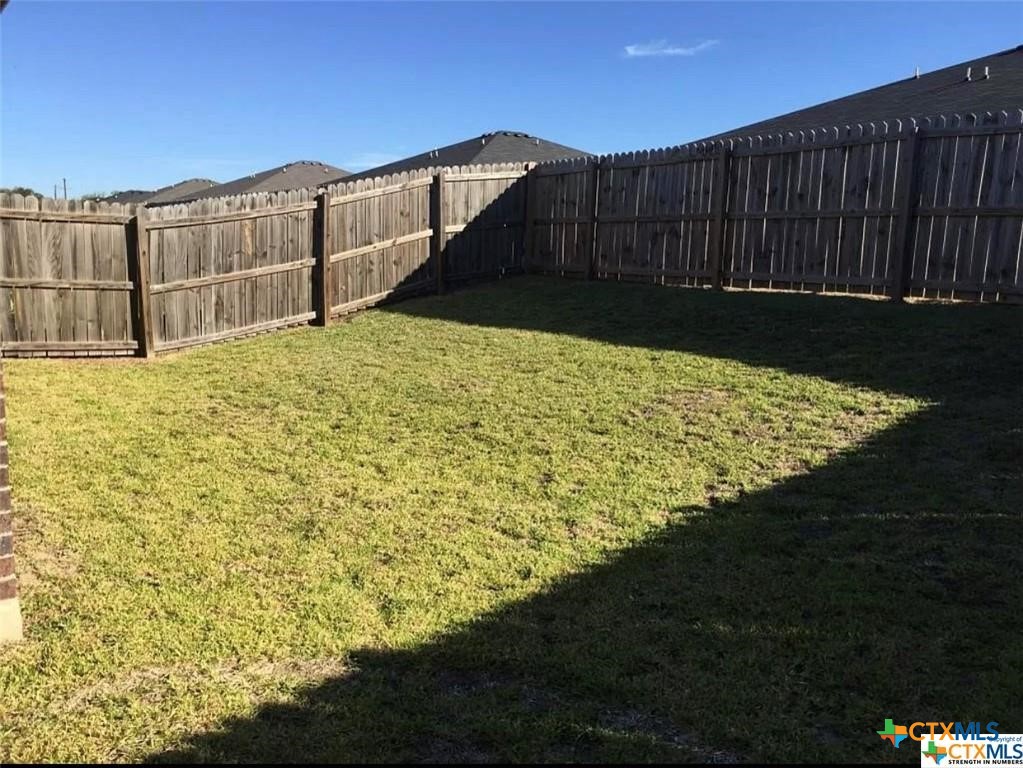 1208 Cavalry Lane, Unit B Killeen, TX 76549 - Photo 16 of 16 a view of a backyard