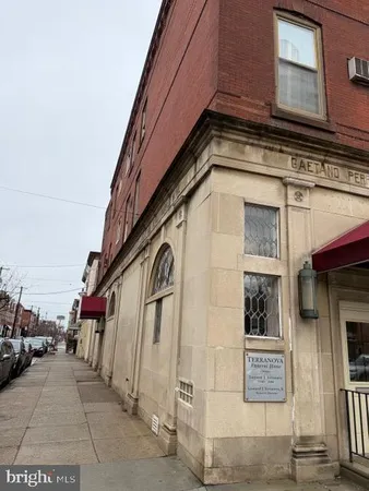 a view of a street with building