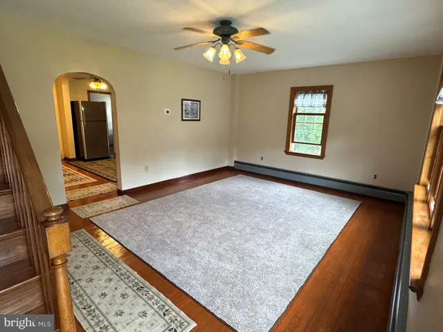 a view of a hallway with workspace