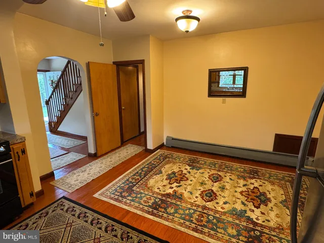 a view of a living room with a rug