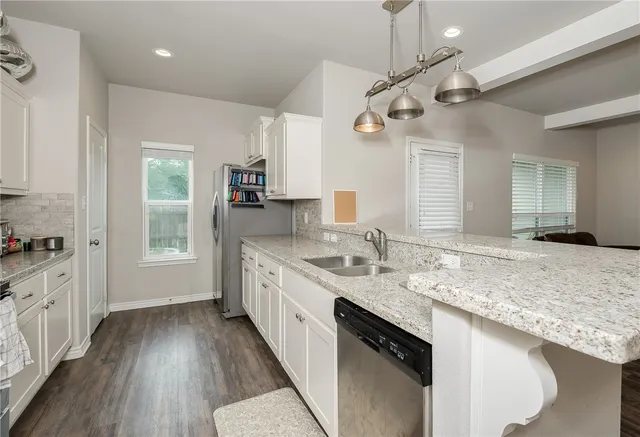 a large kitchen with a lot of counter space