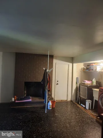 a room with furniture and a fireplace