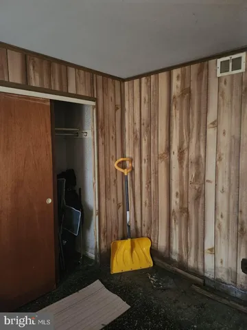 a bathroom with a shower and a sink