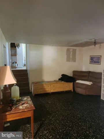 a room with furniture and a fireplace