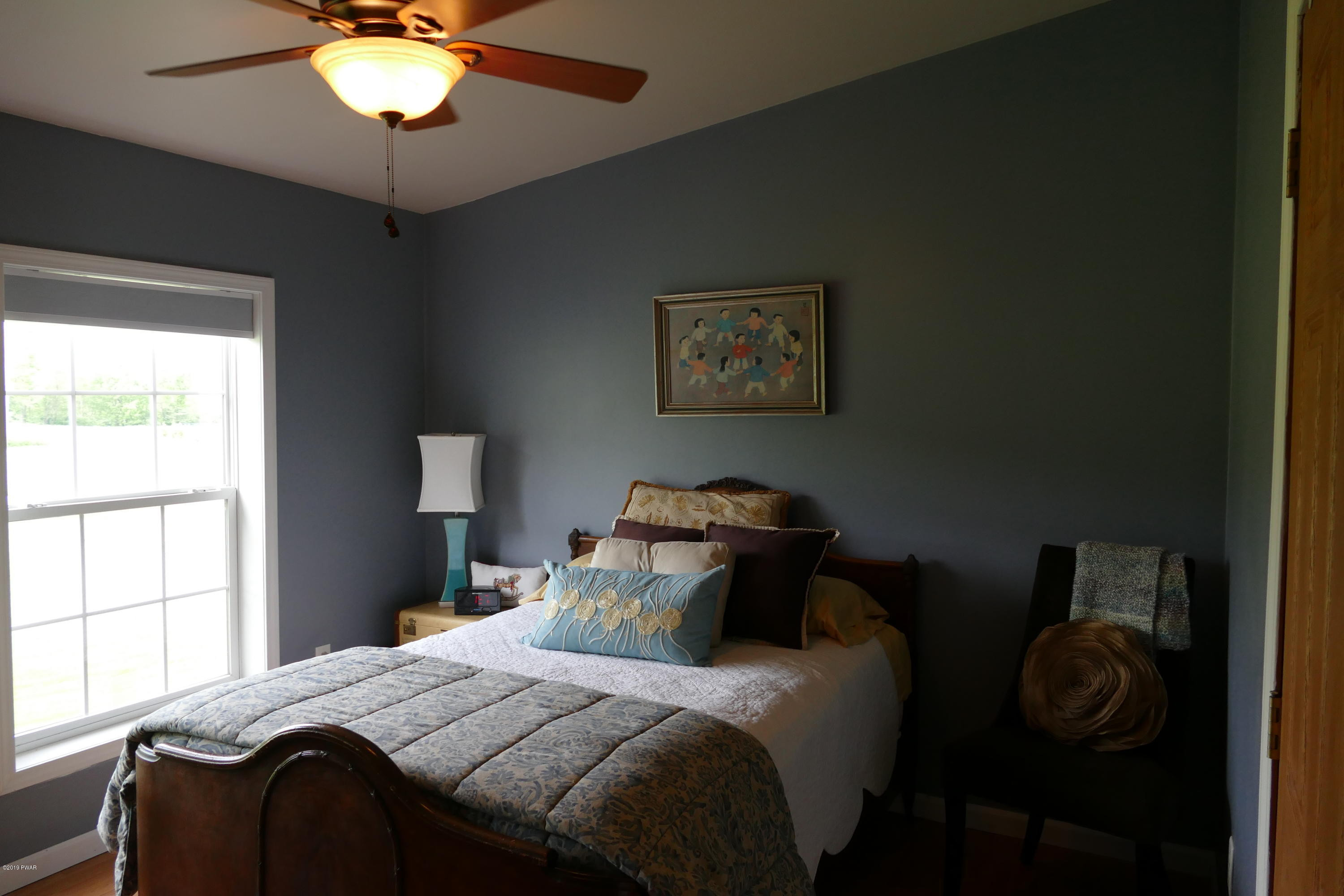 108 Savitz Road Moscow, PA 18444 - Photo 39 of 46 a bedroom with a bed and a window
