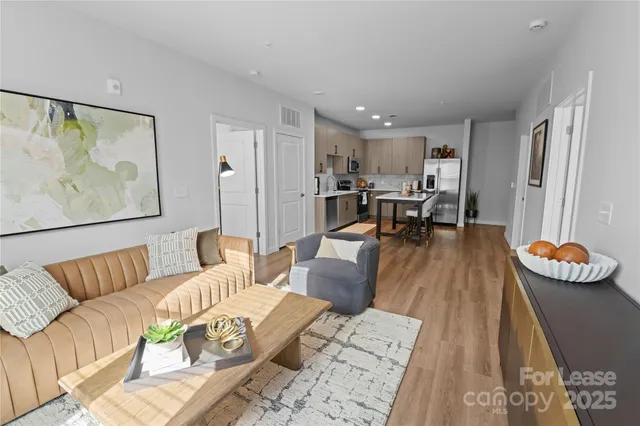 a living room with furniture and a table