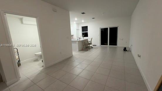 17854 Southwest 359 Terrace Homestead, FL 33034 - Photo 12 of 46 wooden floor in an empty room with a window