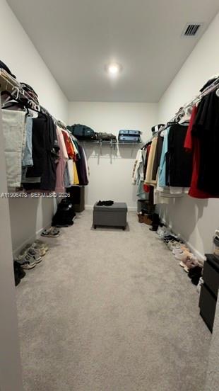 17854 Southwest 359 Terrace Homestead, FL 33034 - Photo 22 of 46 a view of walk in closet with clothes and shoes