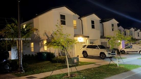 17854 Southwest 359 Terrace Homestead, FL 33034 - Photo 44 of 46 a front view of a building with parking area