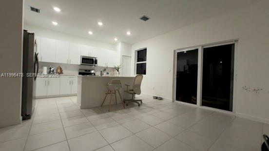 17854 Southwest 359 Terrace Homestead, FL 33034 - Photo 6 of 46 a view of kitchen with microwave and furniture