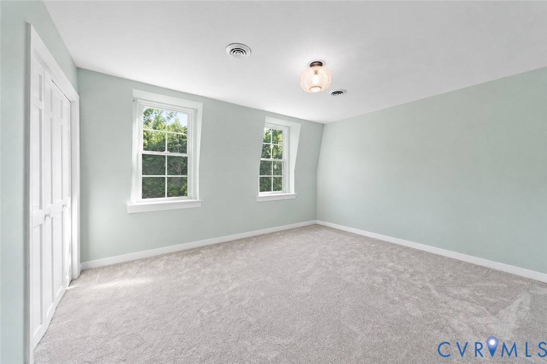 20010 River Road Chesterfield, VA 23838 - Photo 22 of 36 an empty room with windows and closet