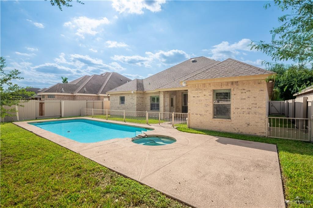 3305 Santa Monica Street Mission, TX 78572 - Photo 22 of 28 a front view of a house with garden