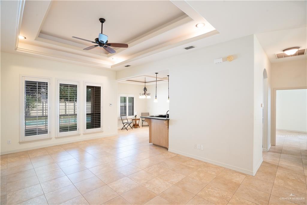 3305 Santa Monica Street Mission, TX 78572 - Photo 4 of 28 a view of a livingroom with a chandelier fan and windows