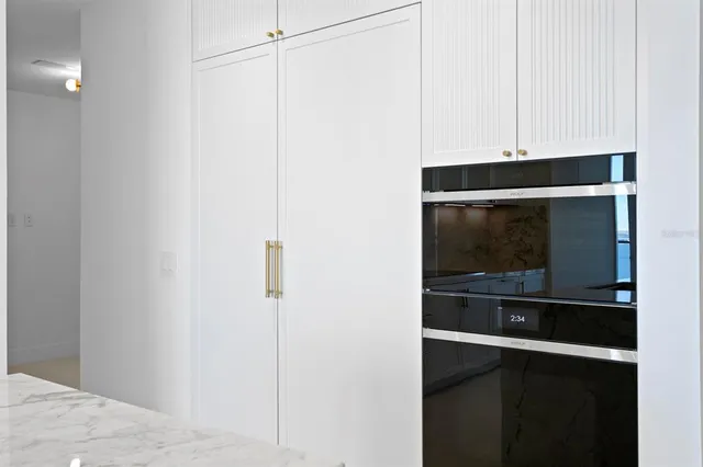 a view of storage and utility room with washer and dryer