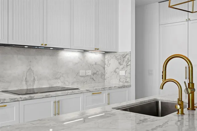 a view of an empty room with windows