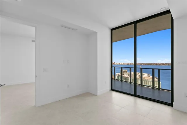 a view of a swimming pool with a lounge chair