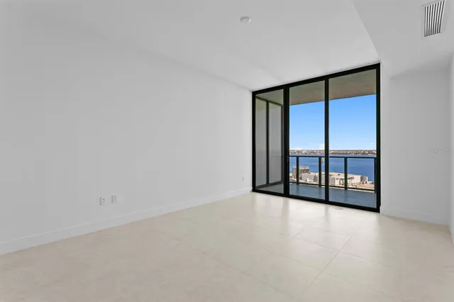 a living room with furniture and flat screen tv