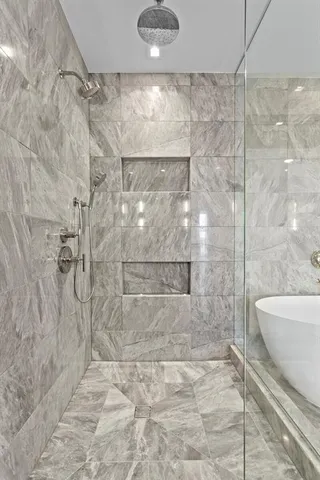a bathroom with a double vanity sink mirror and double