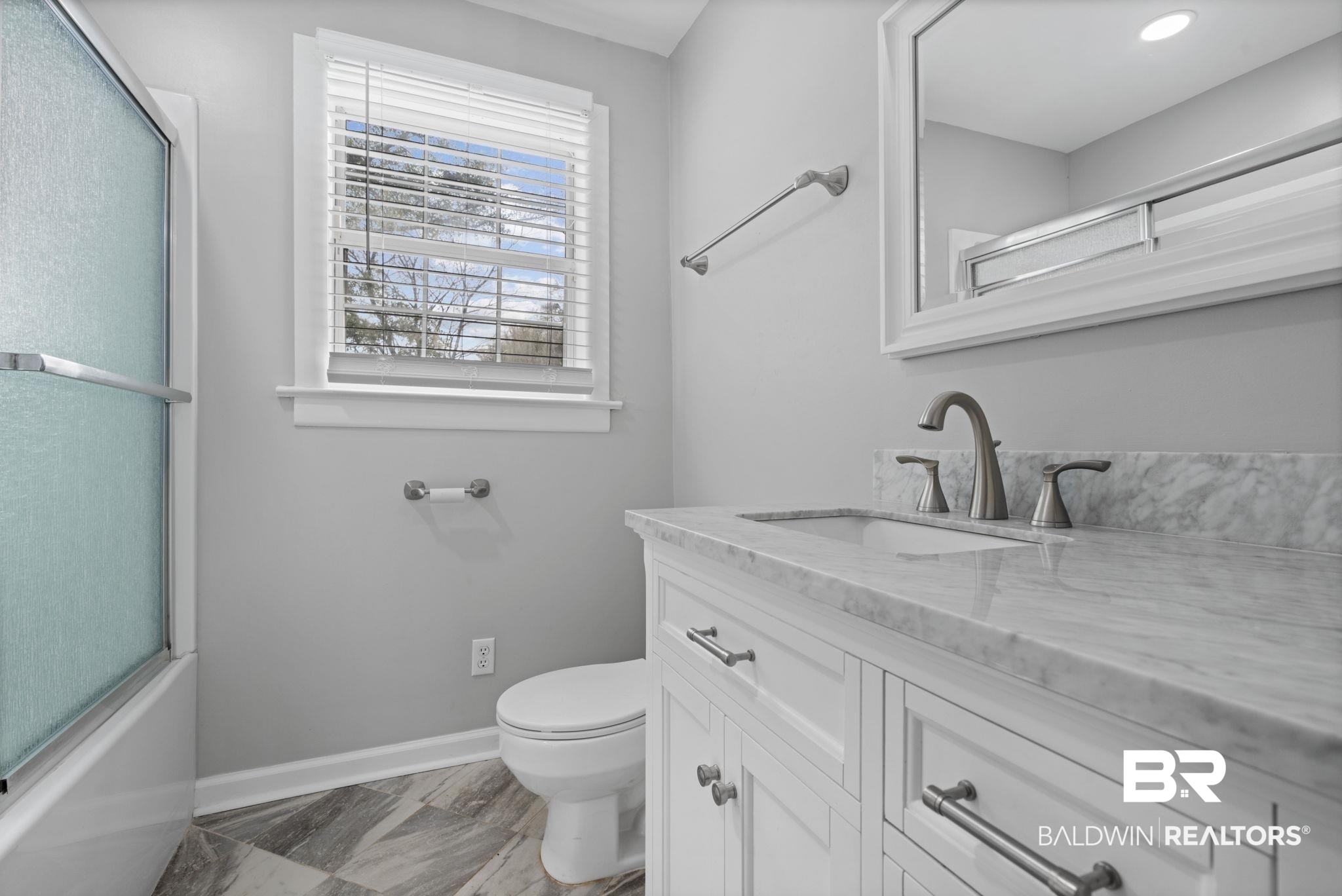 13461 Tom Gaston Road Mobile, AL 36695 - Photo 26 of 41 Bathroom featuring vanity and bath / shower combo with glass door
